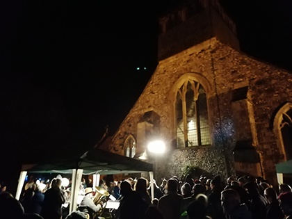 The well-attended 2022 outdoor carol service enjoyed by perhaps 60+ attendees plus silver band
